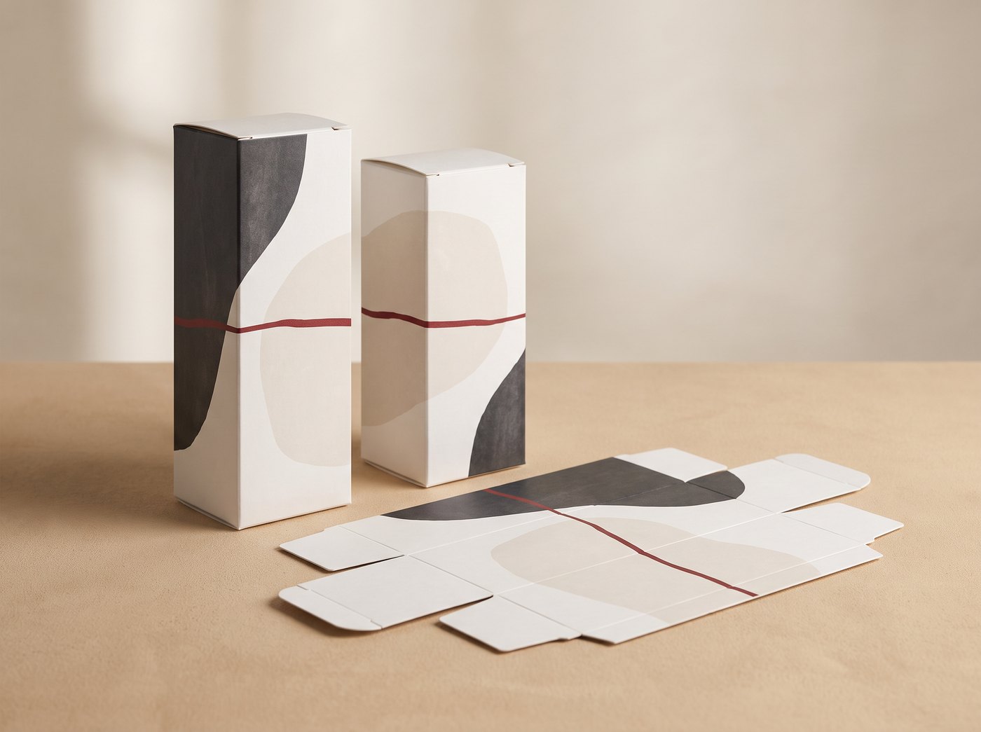 Printed folding cartons at White Graphics: two tuck-end cartons standing and one die-cut blank laid flat