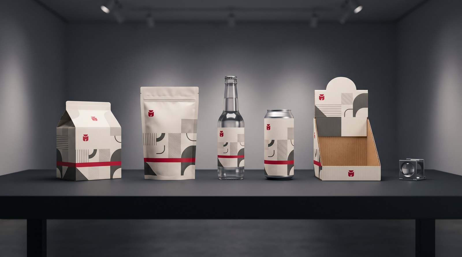 Row of packaging format prototypes — carton, pouch, bottle, sleeved can, and countertop display — lined up for evaluation